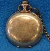 Gold watch with chain and key as described: