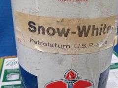 Vintage metal American Oil Snow-White Petrolatum can with contents