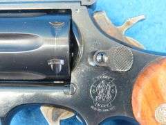 Smith & Wesson Model 17-4 double-action .22 revolver.  SN BEB0730.  Includes original box.