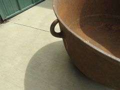 Vintage cast iron kettle 26" wide x 17" deep, has all three feet, marked 30 on the bottom