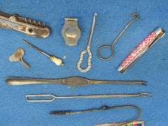 Buttonhooks, Purnia pocket knife, Cunard Steamship Co lobster fork, and more