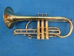 Frank Horton Model C301 cornet. Good used condition.  Valves work good.  Includes two mutes, case, a