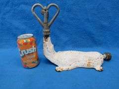 Antique cast iron lawn sprinkler in the form of an alligator.  Unknown maker.