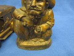 Seven collectible metal banks