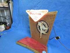 Vintage store display Bulova watch sign works and flashes.