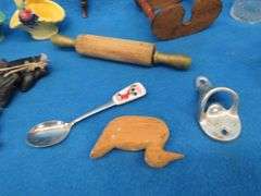 Collectible smalls including a child's egg beater, old amp gauge, vintage pipe, and more