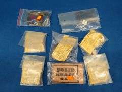 Eight belt buckles from fraternal organizations and one from Smith and Wesson. Some are marked as br
