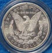 1884 CC Morgan silver dollar in BU condition with a Certificate of Authenticity and display box. Ple