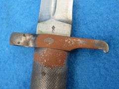 Swedish Mauser bayonet, metal sheath, and leather holder