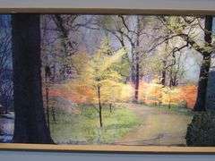 Falstaff American panorama backlit rolling motion sign.  Scenes changes from fall, winter, and summe