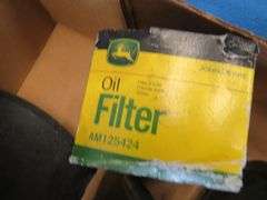 Grease gun, funnel, John Deere oil filter, and more