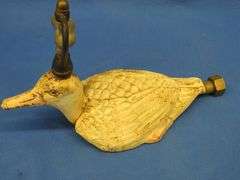 Antique cast iron painted mallard sprinkler with brass fittings, no markings found on casting