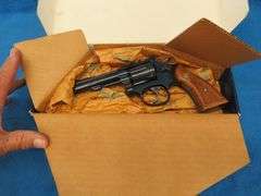 Smith & Wesson Model 17-4 double-action .22 revolver.  SN BEB0730.  Includes original box.