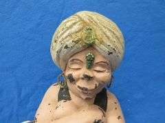 Two wishes left with this plaster Genie and bottle.  20" tall with original paint.