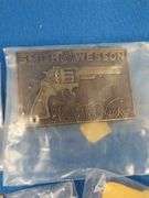 Eight belt buckles from fraternal organizations and one from Smith and Wesson. Some are marked as br