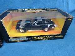 Hannah Montana game, Maisto 1998 Corvette Convertible 1:18, and an AM Muscle 1967 Corvette Stingray 