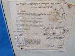 Falstaff American panorama backlit rolling motion sign.  Scenes changes from fall, winter, and summe