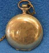 Gold watch with chain and key as described: