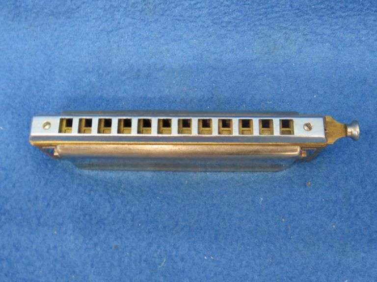 Wm. Kratt Super "48" chromatic harmonica with a soft case