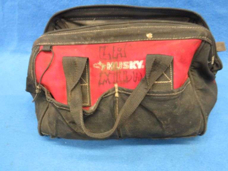 Two tool bags with contents including Snap-On, Craftsman, Husky, and more