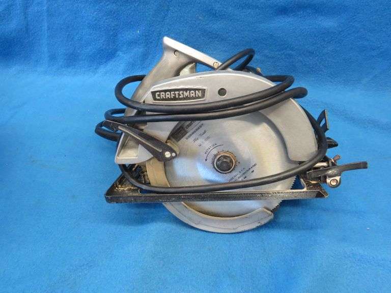Craftsman 7" circular saw in a metal case.  Includes 3 new and 3 used extra blades.