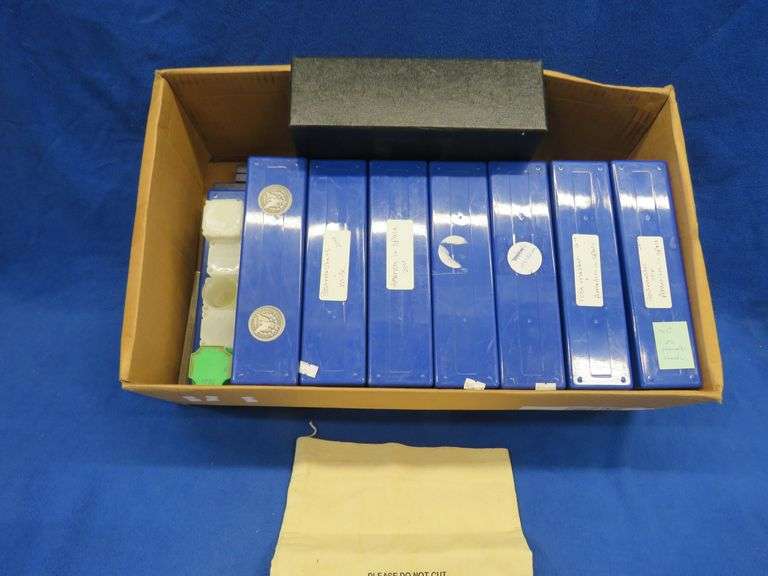 Coin collector organizer kit that includes 15 plastic divider trays for slabbed coins, coin tubes, a