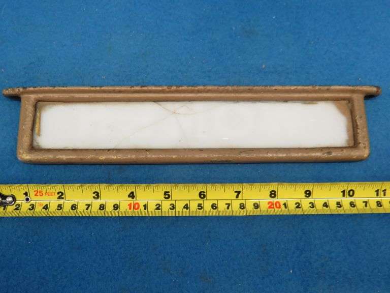 Vintage glass restroom signs in cast iron frames