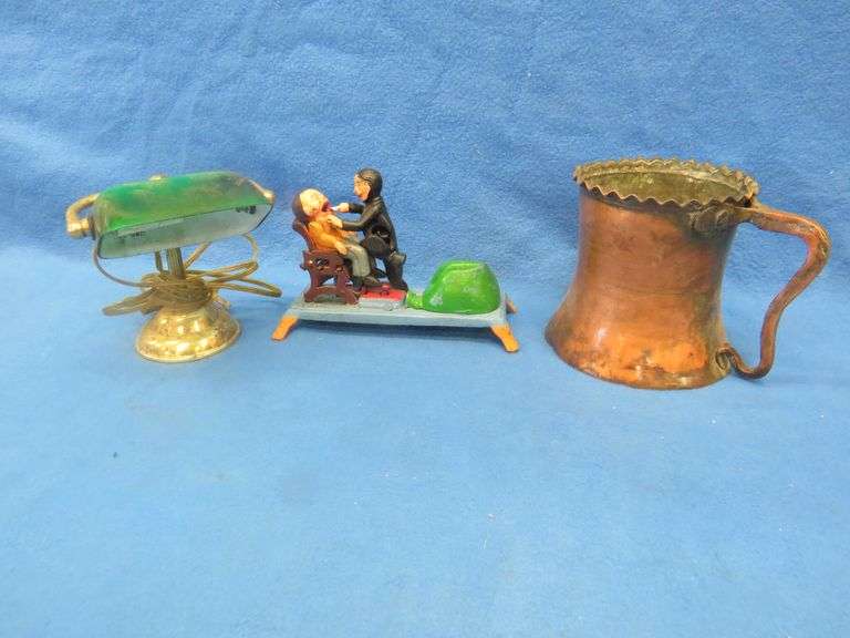 Large copper mug, small office lamp, and a dental-themed mechanical bank from Taiwan