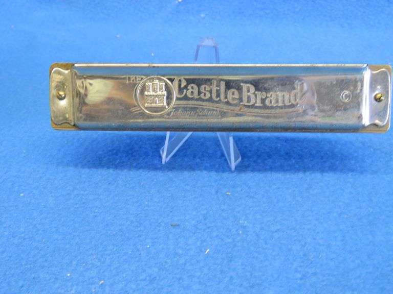 Johann Schrunk Castle Brand tremolo key of C harmonica with 20 holes.