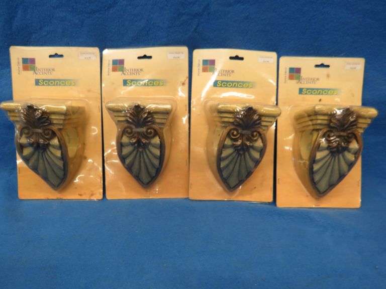 Four new-in-the-package sconces