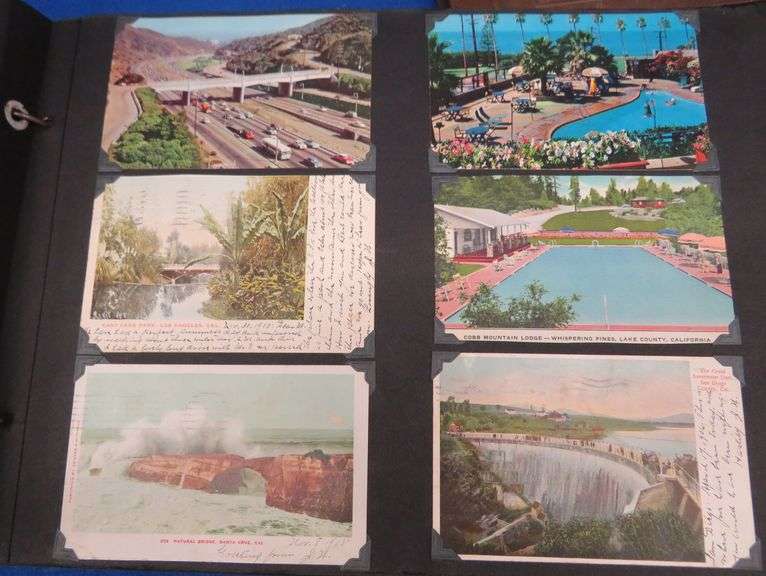 Three vintage photo albums. One has over 500 photos or postcards of bridges. Two are unused