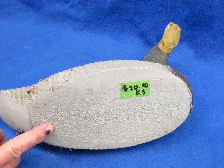 Vintage wooden duck decoy with glass eyes