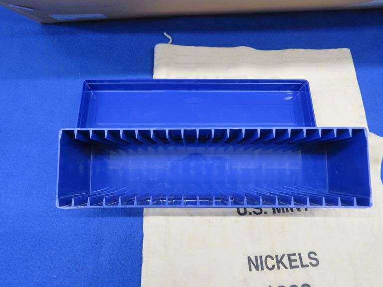 Coin collector organizer kit that includes 15 plastic divider trays for slabbed coins, coin tubes, a