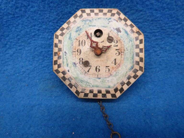 Four clocks for parts or repair.[ The large rectangular clock and the small round brass clock are Lu