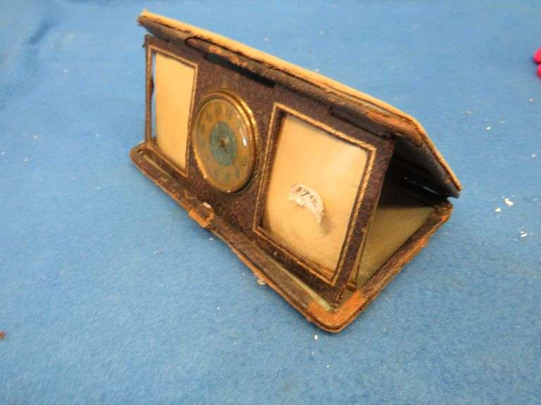 Four clocks for parts or repair.[ The large rectangular clock and the small round brass clock are Lu