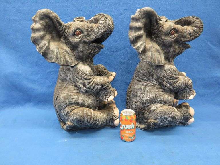 Pair of plaster elephants named Larry and Ryan.  Some small nicks.