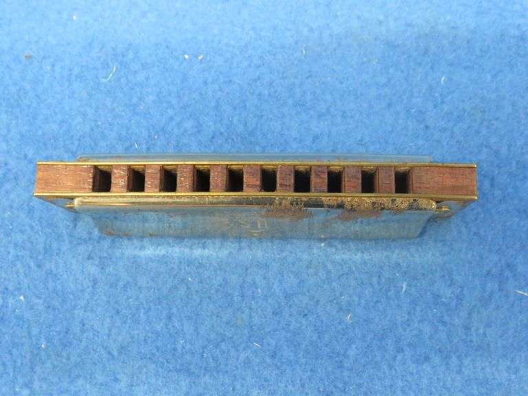 Harmonic Reed Co. All-Star 10-hole diatonic harmonica.  Sounds great.  Has some surface rust.