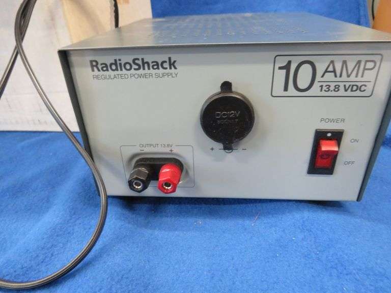 Vintage sabre saw and sander, battery charger, and more