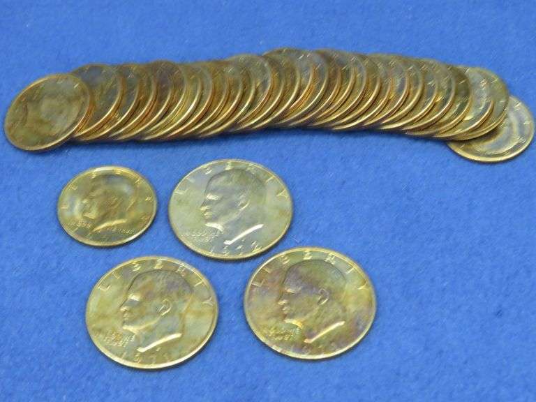 30 clad Kennedy halves and three Eisenhower dollars