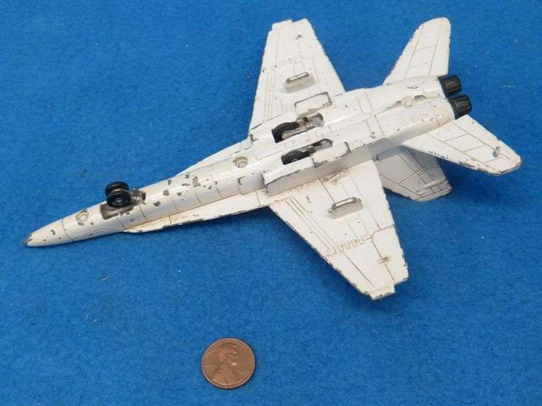 Three die-cast airplanes