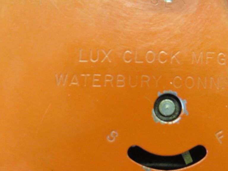 Lux animated clock with a working spinning wheel
