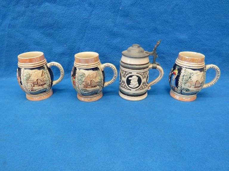 Three beer mugs and one stein