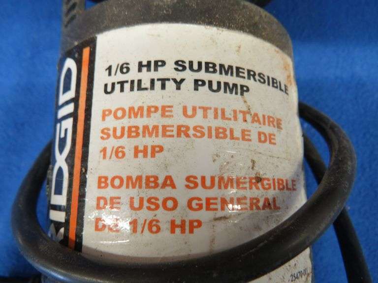 Yard care items such as sprinkers and sprayers, a submersible pump that powered up, and more