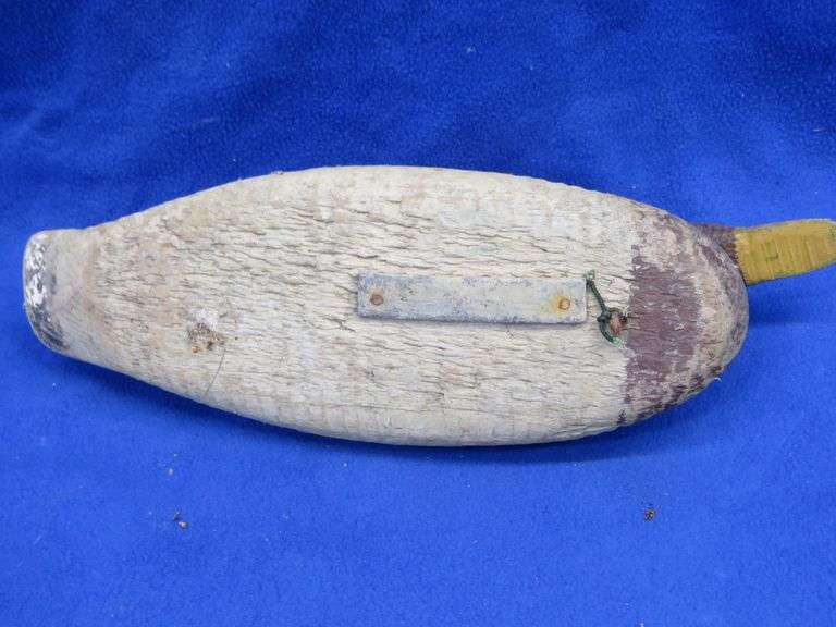 Vintage wooden duck decoy with glass eyes