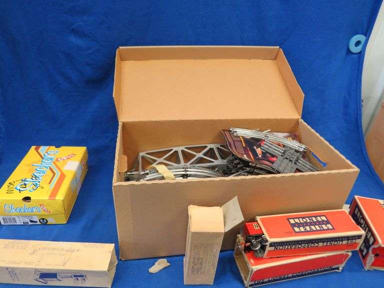 Vintage Lionel Train set with lots of cars, track, and some cool accessories