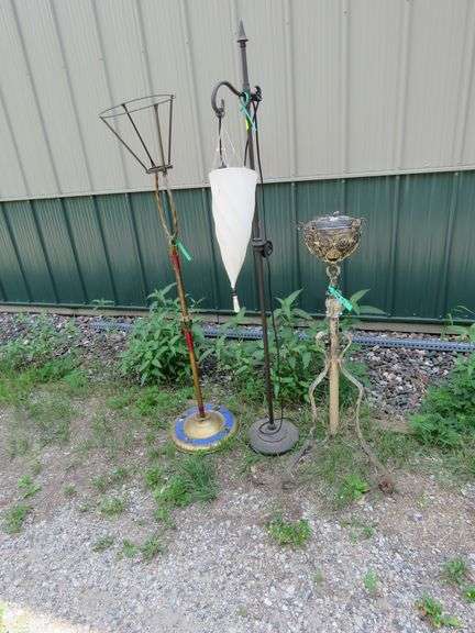 Two floor lamps and a vintage lamp stand