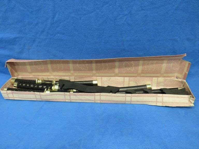 Three-sword set with scabbards and display stand