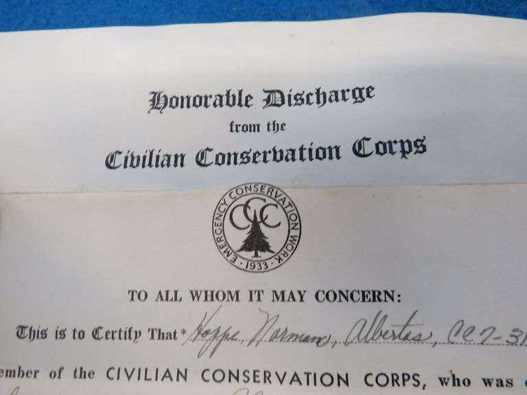1940 CCC (Civilian Conservation Corps) discharge papers, WW2 ration books with and without stamps, a