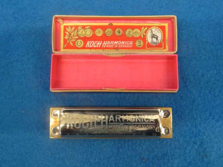 Koch like-new "Bugle Call" 10-hole diatonic harmonica in the key of G.  Sounds great.  Box is in exc
