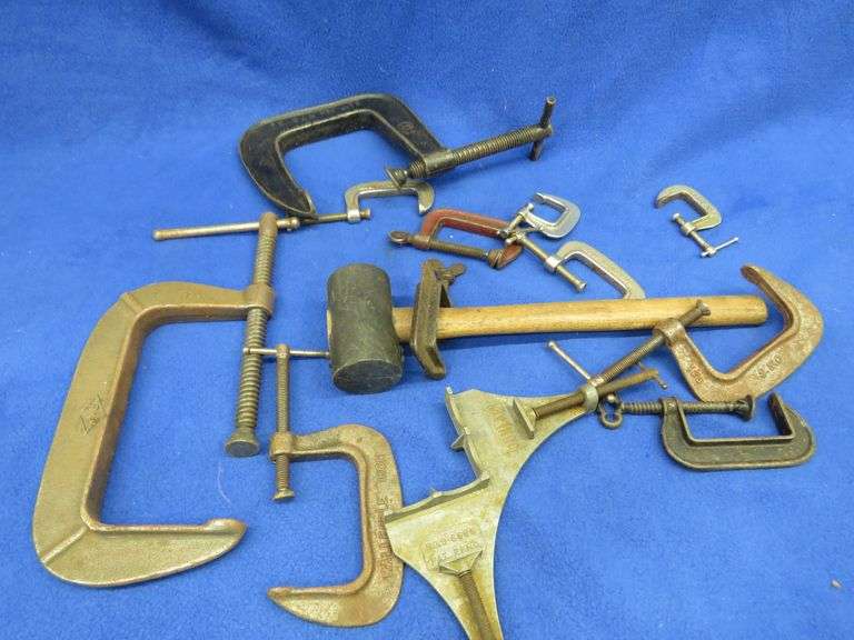 Different sized C-clamps and a rubber mallet
